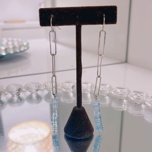 Made by hand with paper clips and aquamarine stone